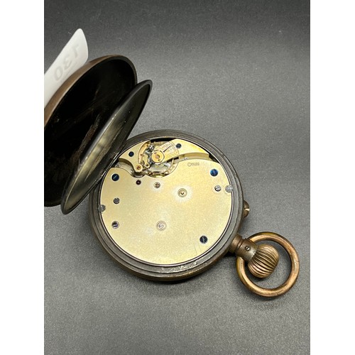 130 - Antique large travel pocket watch, Swiss made, Enamel face with roman numerals. [In a working condit... 