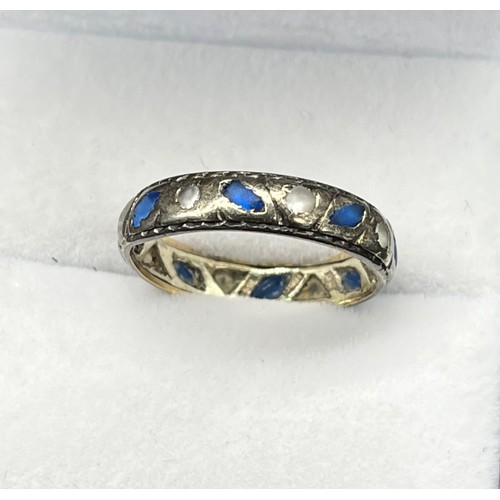 128 - Vintage 9ct white gold band ring set with rubbed/ worn white and blue stones. [Ring size Q] [2.78Gra... 