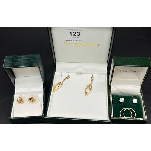 123 - Four pairs of 9ct gold earrings.