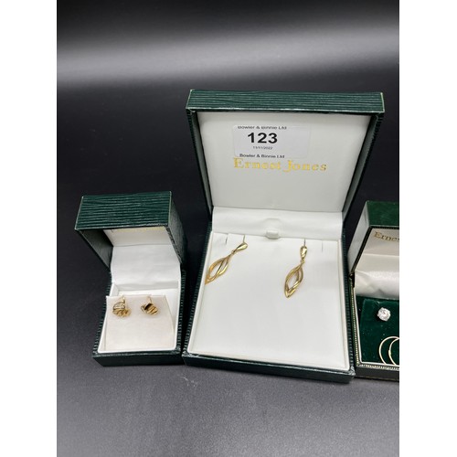 123 - Four pairs of 9ct gold earrings.