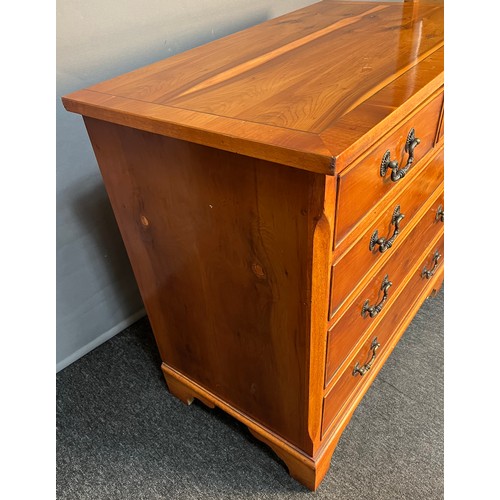 157 - Yew wood chest of drawers, the rectangular top above two short drawers and three long graduating dra... 