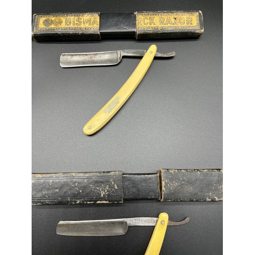 162 - Four vintage cut throat razors includes Bismarck & Tempagold.