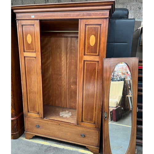 907 - Victorian wardrobe, the moulded cornice above a single mirrored door [needs reattached] flanked by i... 