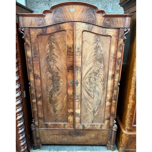 905 - 19th century burr walnut wardrobe, the shaped and moulded cornice above two doors opening to interio... 