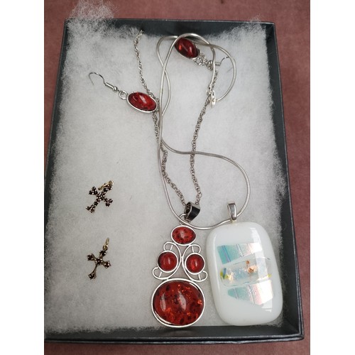 66A - Amber style necklace and earrings set together with 2 silver cross earrings set with garnet stones t... 