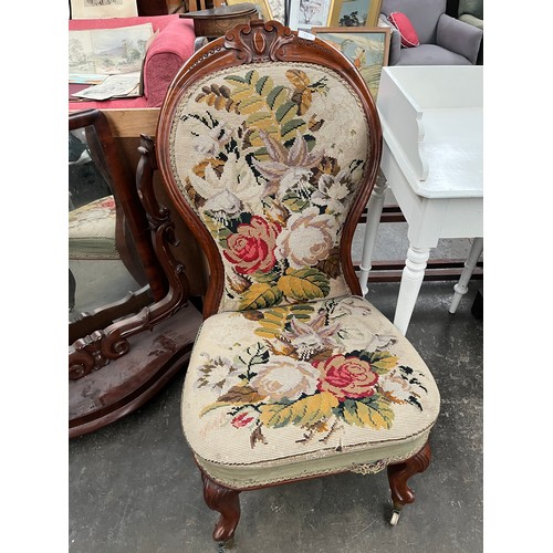 73A - 19th century spoon back nursing chair. Embroidered back and seat area. [Missing castor]