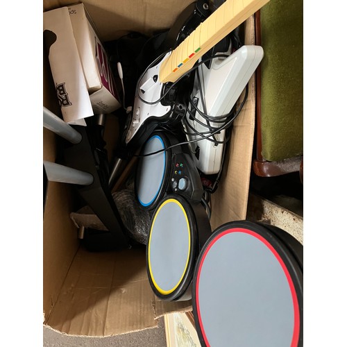 144A - Box of Guitar hero accessories and Xbox controllers