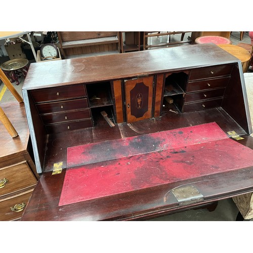 154A - Georgian four drawer writing bureau.