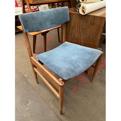 293A - A Pair of mid century chairs.