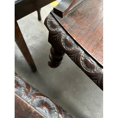 307A - Two 19th century oak carved chairs, designed with barley twist legs. [Need attention]