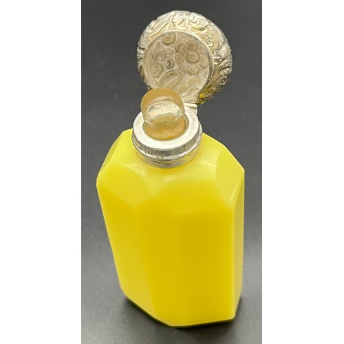 50 - Antique 19th century facet cut glass/ yellow stone perfume bottle fitted with a silver top. Has glas... 