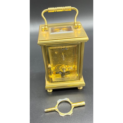 131 - Heavy brass carriage clock produced by Angelus- made in England. Single barrel movement- 11 jewels. ... 