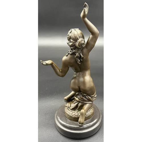 215 - Bronze nude lady sculpture sat upon a round marble base. Signed Milo. [26cm high]