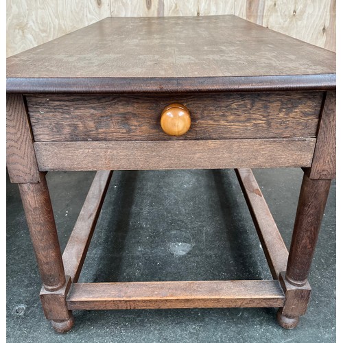 440 - Antique oak kitchen table/prep table, the rectangular surface above a frieze drawer raised on turned... 