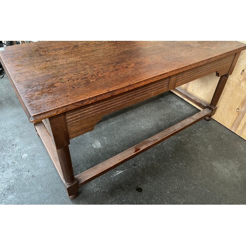 440 - Antique oak kitchen table/prep table, the rectangular surface above a frieze drawer raised on turned... 