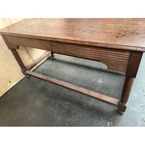 440 - Antique oak kitchen table/prep table, the rectangular surface above a frieze drawer raised on turned... 