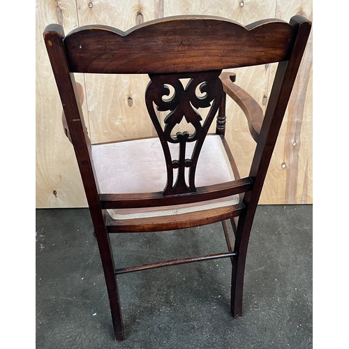 405 - Edwardian bedroom chair, the shaped back above central carved and pierced stretcher and open arms, r... 