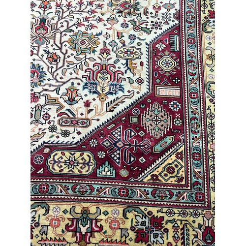 355 - Fine Persian carpet/rug, red and cream ground, highly decorative. [347x250cm]