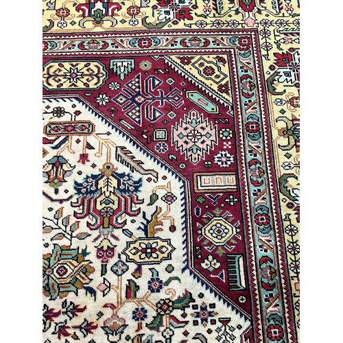 355 - Fine Persian carpet/rug, red and cream ground, highly decorative. [347x250cm]