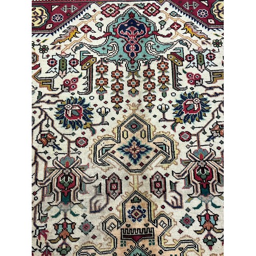 355 - Fine Persian carpet/rug, red and cream ground, highly decorative. [347x250cm]