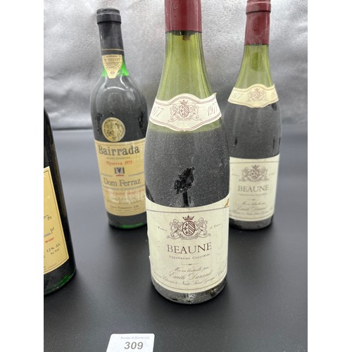 235 - Six bottlings of wine. 1978 Chateau Talbot, Two Bottles of 1977 Beaune, Two Bottles of Bairrada Rese... 