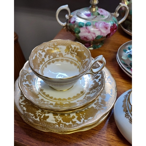 104 - A 10 Piece Hammersley & co part tea set together with a hand painted Victorian rose design tea pot, ... 