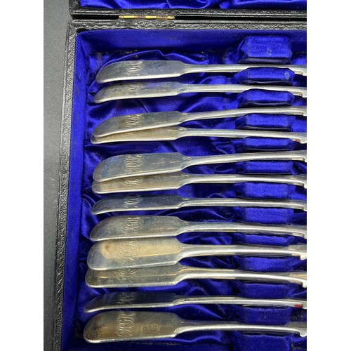 23 - A Boxed set of 12 Glasgow silver dessert spoons. All number 1-12and Engraved with initials. Produced... 