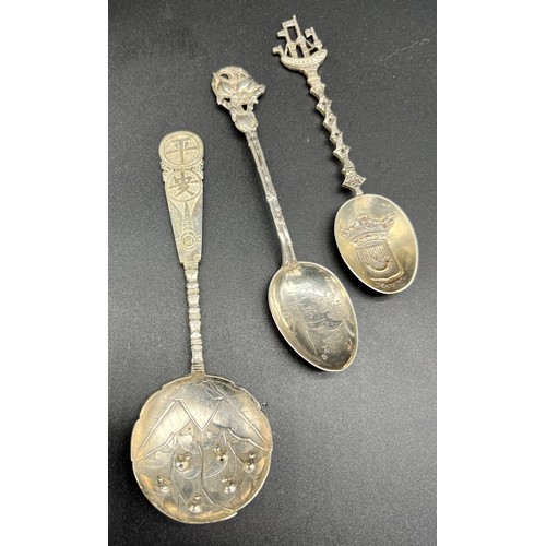 36 - A Collection of silver items includes cream jug, Chinese caddy spoon, Georgian sugar tongs and vario... 