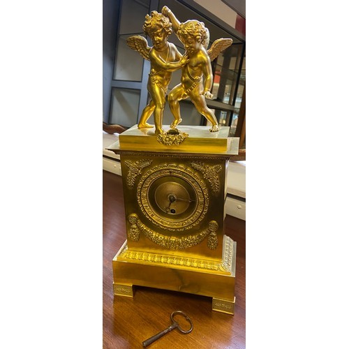 103 - A 19th century gilt brass ormolu mantle clock produced by Villemsens- A. Paris. Fitted with two cher... 