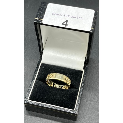 4 - Birmingham marked 9ct yellow gold Celtic design band ring. [Ring size R] [3.90Grams]