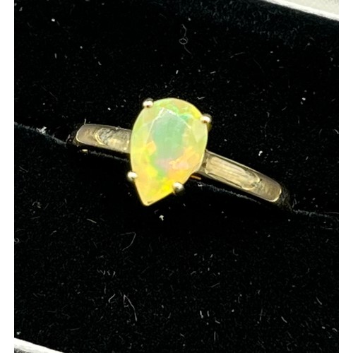 218 - 10ct yellow gold ladies ring set with a pear cut opalescent style stone [Ring size P] [2.28Grams]