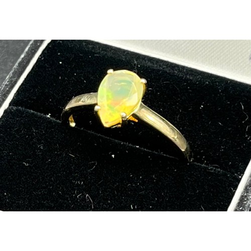 218 - 10ct yellow gold ladies ring set with a pear cut opalescent style stone [Ring size P] [2.28Grams]