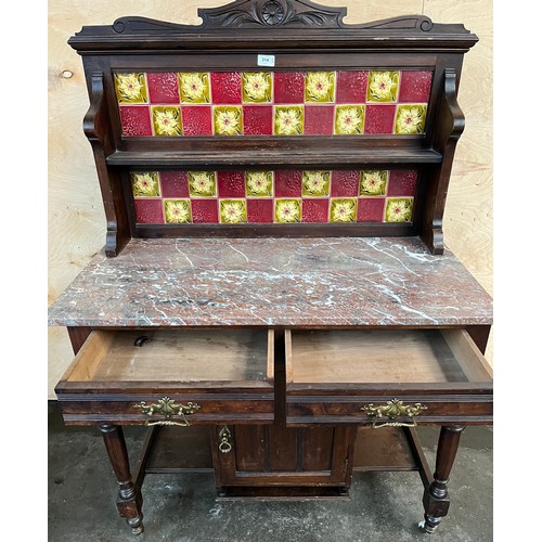 314 - Antique washstand, the art nouveau themed tile back with open shelf above a marble surface, two draw... 