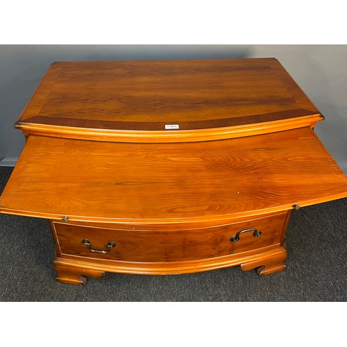 311 - 20th century yew wood chest of drawers, the rectangular top with bow front above a pull-out ledge an... 