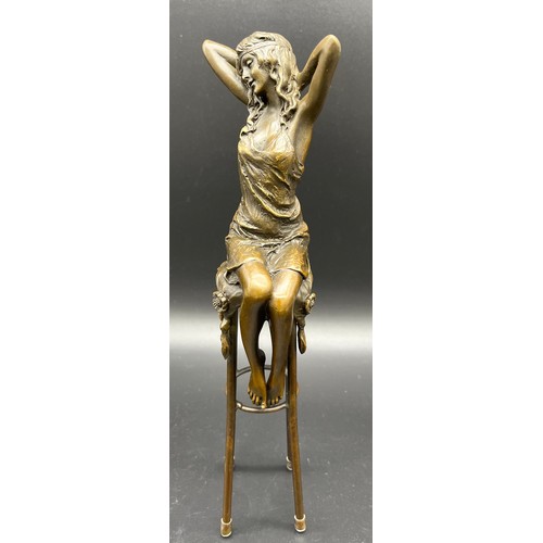 226 - Bronze Statue of an Art Nouveau lady figure seated on a stool. Signed Pierre Collinet. [27.5cm high]