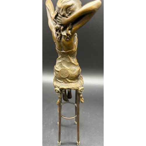 226 - Bronze Statue of an Art Nouveau lady figure seated on a stool. Signed Pierre Collinet. [27.5cm high]