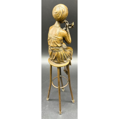 206 - Bronze Statue of an Art Nouveau lady seated on a stool, Signed D.H. Chiparus. [27cm high]