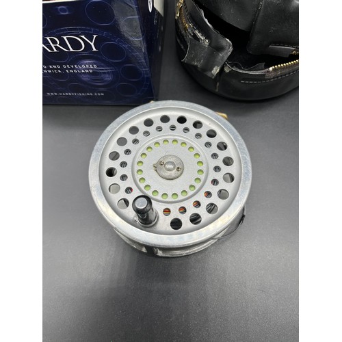 129 - Hardy Bros. 'Marquis' Salmon No.2. Fly reel, line and pouch, Comes with box- not original box.