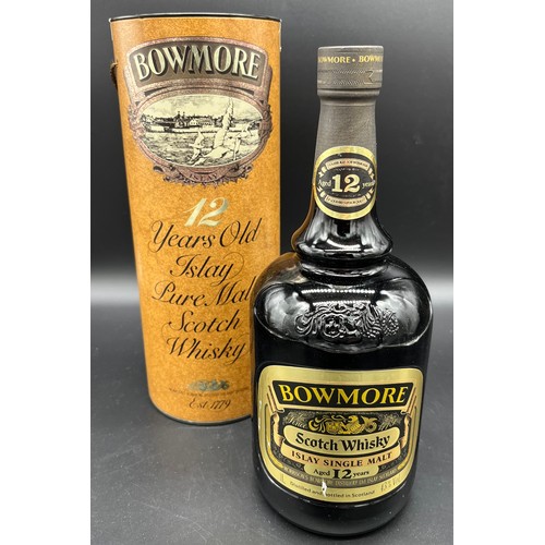 122 - Bottle of Bowmore 12 years old Islay Pure Malt Scotch Whisky, 1 litre. Full, sealed and comes with t... 