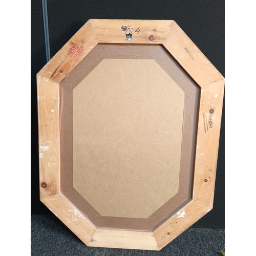 196 - Octagonal carved mirror [86x66cm]