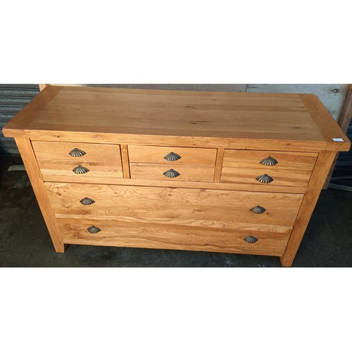 343 - Vancouver Oak long chest of drawers, the rectangular surface above an arrangement of six short drawe... 