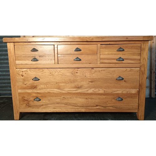 343 - Vancouver Oak long chest of drawers, the rectangular surface above an arrangement of six short drawe... 