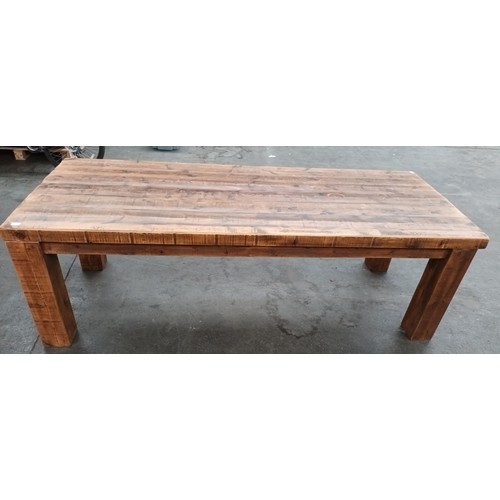 348 - Solid rustic wood dining table, the long rectangular surface raised on square block legs [80x244x97c... 