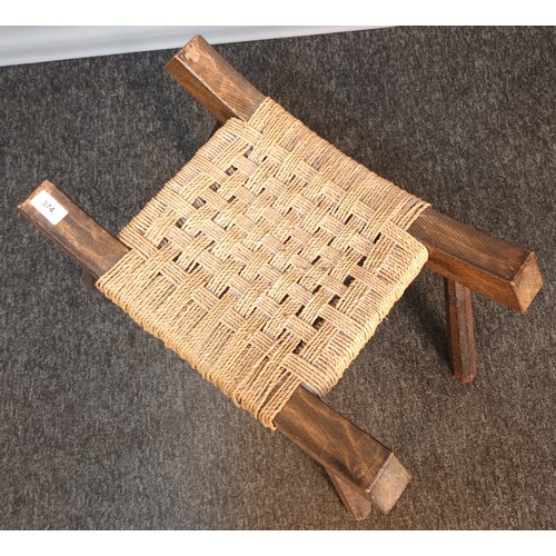 374 - Early 1920's oak framed stool with weaved seat [40x44x33cm]