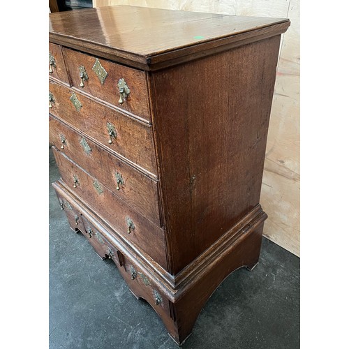 389 - Early 17th century chest on chest, the rectangular top above two short drawers and three graduating ... 