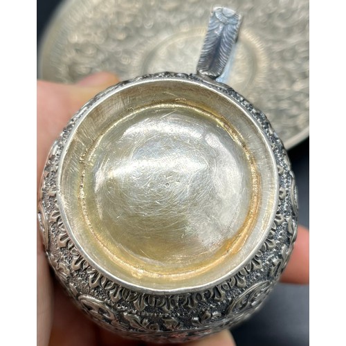 78 - Indian silver highly decorative cup and saucer. [Tested positive silver] [226.18grams]