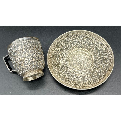 78 - Indian silver highly decorative cup and saucer. [Tested positive silver] [226.18grams]