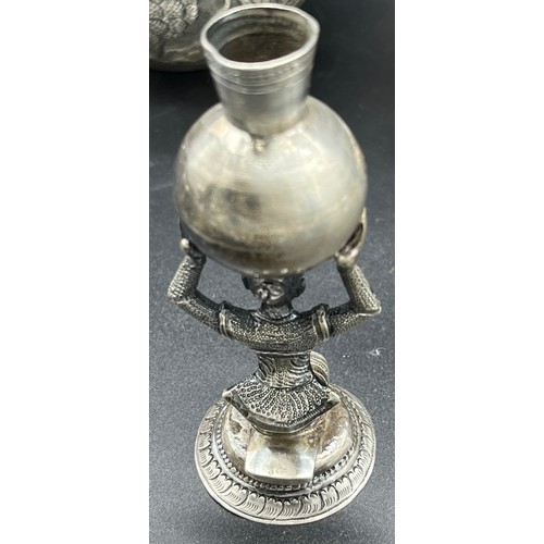 82 - A Collection of four Colonial Indian silver items. Includes Small figure with pot above their head, ... 