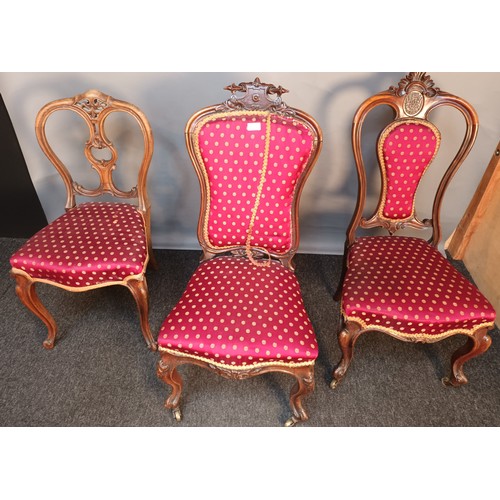 393 - Three Victorian bedroom chairs all with matching upholstery and raised on cabriole legs [98cm high]