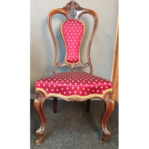 393 - Three Victorian bedroom chairs all with matching upholstery and raised on cabriole legs [98cm high]